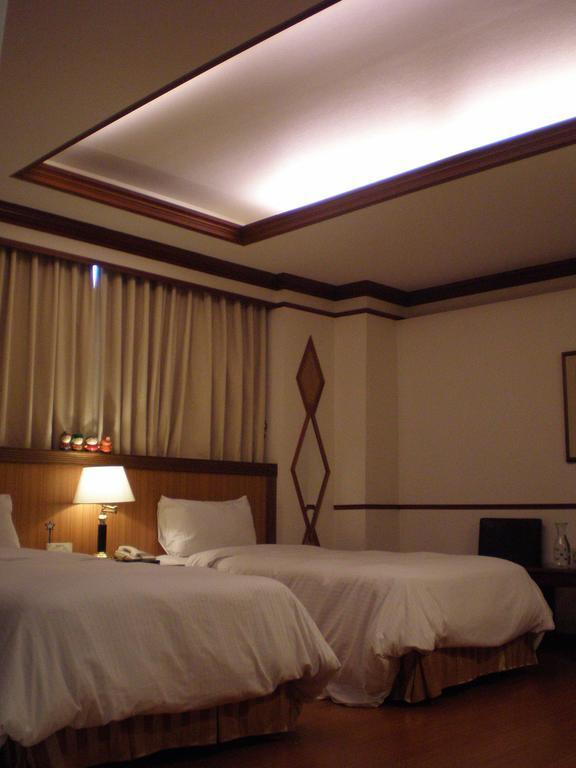 Emperor Hotel Kaohsiung Rom bilde