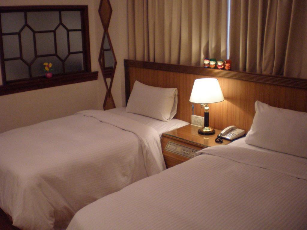 Emperor Hotel Kaohsiung Rom bilde